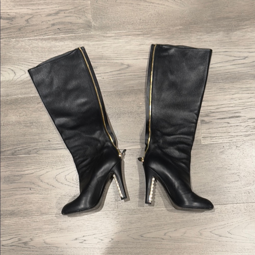 Black Leather Knee-High Boots with Gold Accents